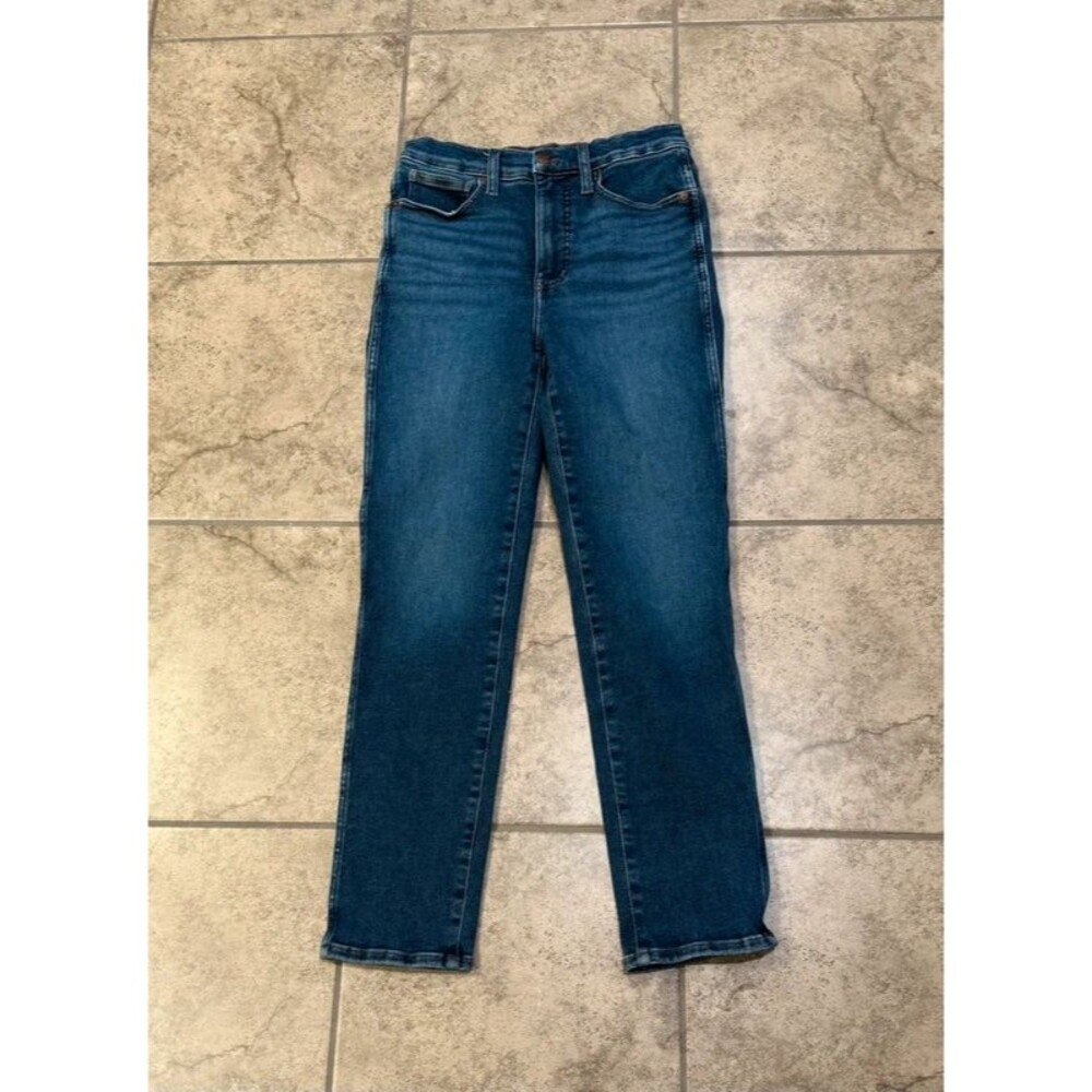 pair of Madewell Stovepipe Jeans in a size 27